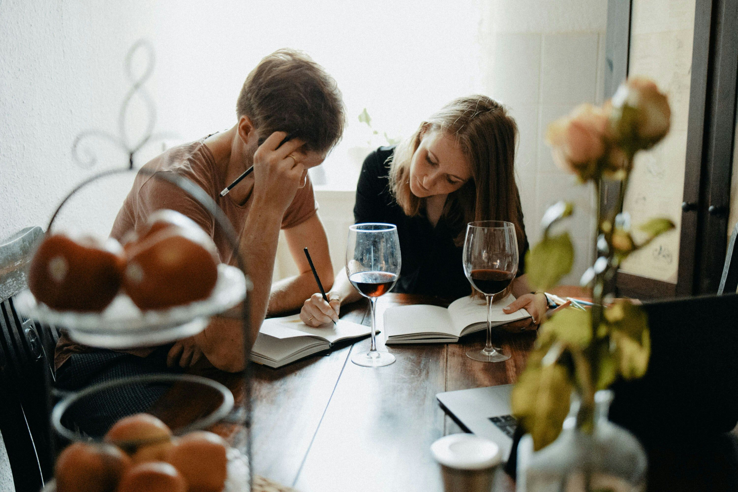 A couple planning together at the table